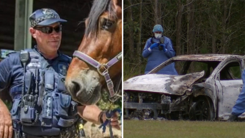 Queensland Police officer David Masters killed by car while laying road spikes to stop allegedly stolen car.