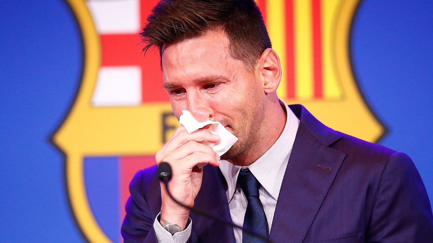 Teary Messi leaves door open for Barca return