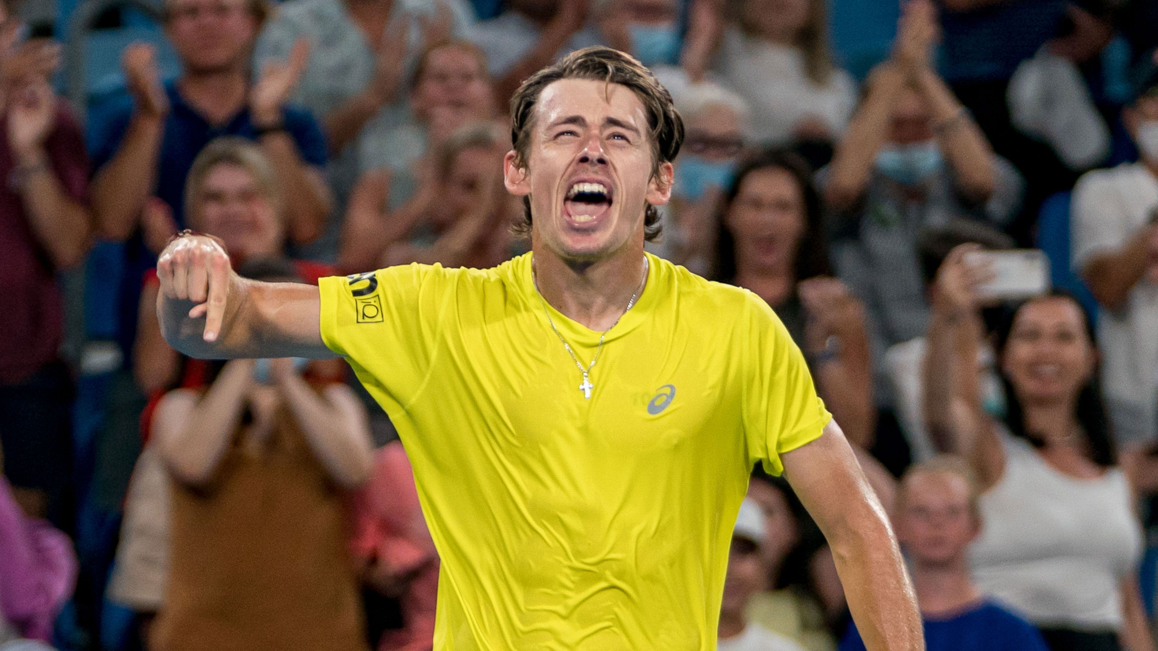 Australia&#x27;s Alex De Minaur celebrates a huge ATP Cup victory over Italy&#x27;s Matteo Berrettini.