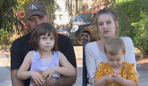 Azarliah Jones (bottom left) and her parents Simon and Alana on two-year wait for appointment over ear condition requiring surgery