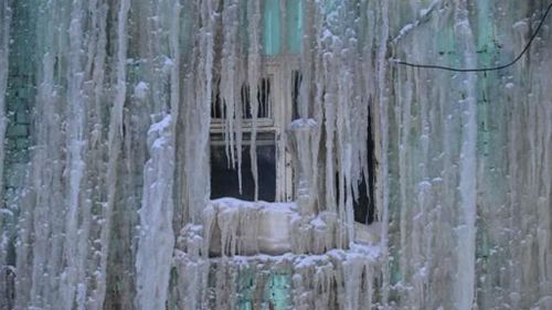 Icicles crowd in on a window sill in Dudinka (Twitter).