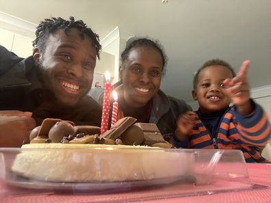 Niama Ibrahim with her two sons in their home.