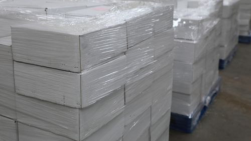 Police allege 360 boxes of the tiles were found to be impregnated with the drug.