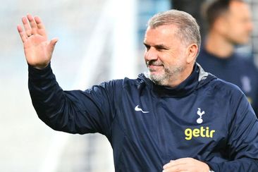 Ange Postecoglou, Manager of Tottenham Hotspur, acknowledges the crowd during a Tottenham Hotspur FC Open training session at AAMI Park.