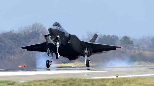 In this photo provided by South Korea Defense Acquisition Program Administration, a US F-35A fighter jet lands at Cheongju Air Base in Cheongju, South Korea.