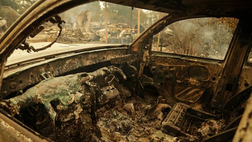
The remains of an automobile sit in the Coffey Park area of Santa Rosa. (AP)
