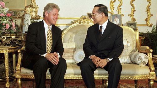 US President Bill Clinton with Thailand's King Bhumibol Adulyadej at Chitrlada Palace in Bangkok in 1996. (AAP)