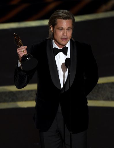 Brad Pitt accepts the award for best performance by an actor in a supporting role for "Once Upon a Time in Hollywood" at the Oscars on Sunday, Feb. 9, 2020, at the Dolby Theatre in Los Angeles.