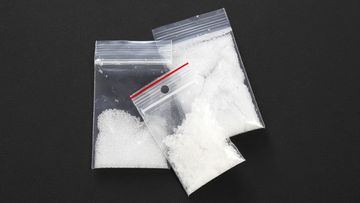 File image: Drugs in white plastic bags.