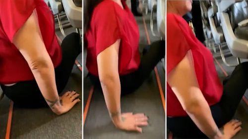 In a video, Natalie Curtis can be seen crawling across the floor to get to her wheelchair and get out of a Jetstar plane.