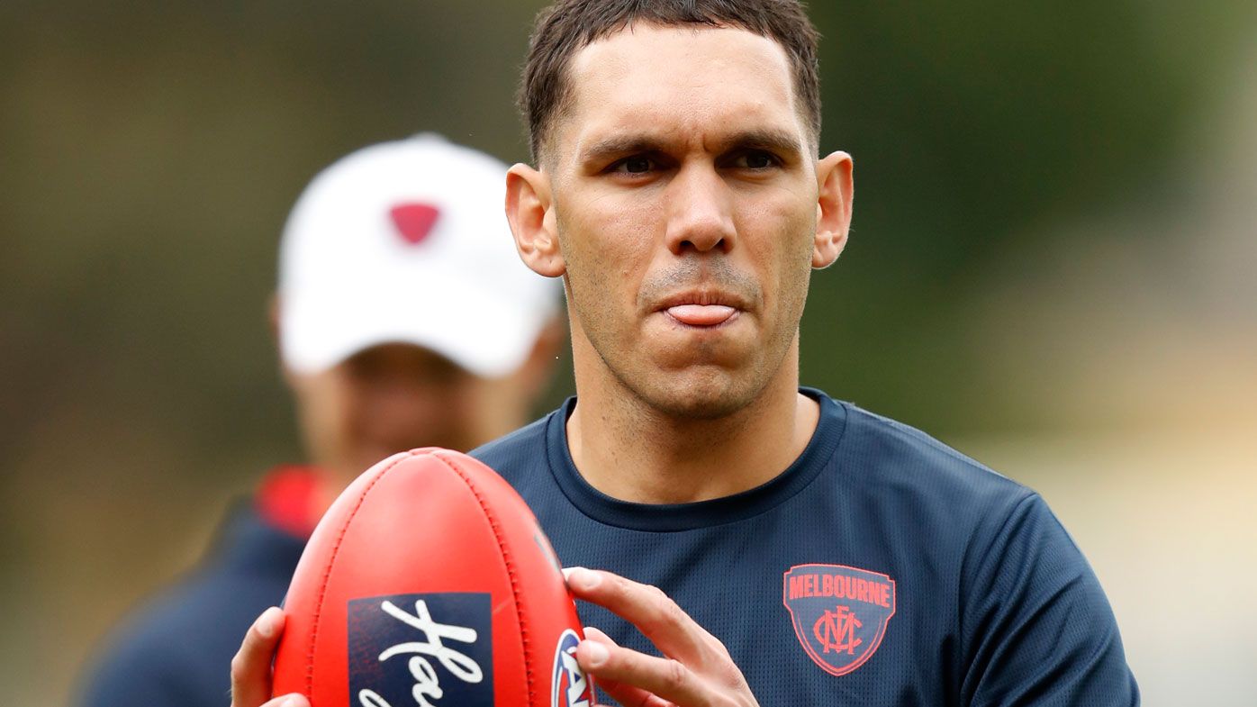 Harley Bennell completes some handball drills during a Melbourne Demons training session