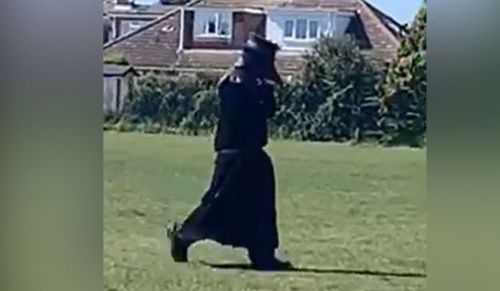 A man dressed as a 17th Century plague doctor has been spotted walking around a park in the village of Hellesdon, near Norwich.