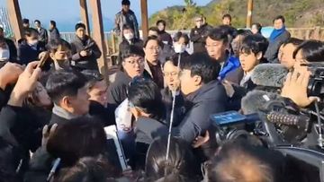  Lee was attacked and injured by an unidentified man during a visit Tuesday to the southeastern city of Busan, emergency officials said. 