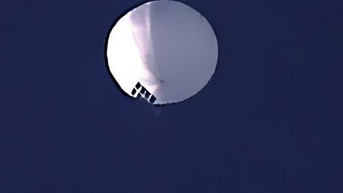 A high altitude balloon floats over Billings, Montana on Wednesday, Feb. 1, 2023. 