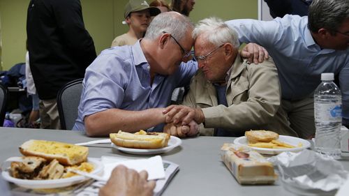 PM comforts victim of NSW fires