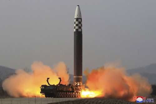 This photo distributed by the North Korean government shows what it says is a test-fire of a Hwasong-17 intercontinental ballistic missile. 
