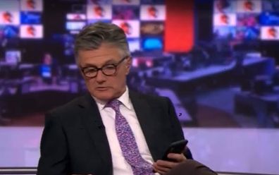 BBC News host caught with feet up on desk