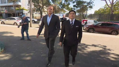 George Burgess outside court today with his lawyer Bryan Wrench.