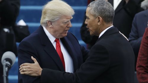 Mr Trump meets with then-current US President Barack Obama on the day of the former's inauguration.