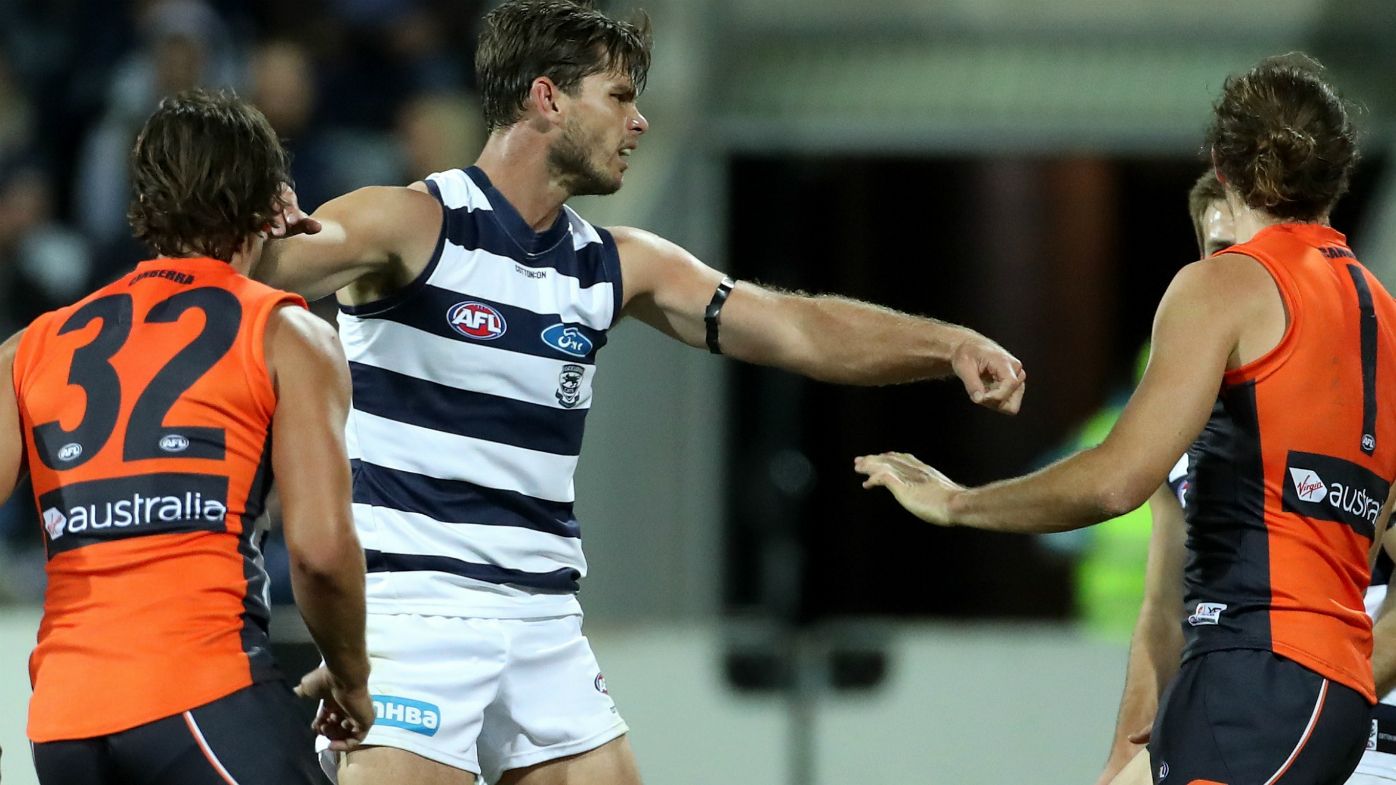 Geelong Cats forward Tom Hawkins cops one-match AFL ban for umpire contact