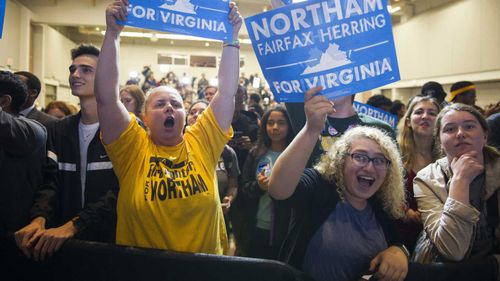 Ralph Northam fans celebrate his victory. (AAP)