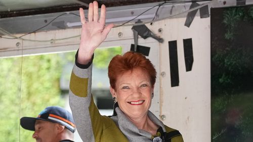 MELBOURNE, AUSTRALIA - NOVEMBER 30: Senator Pauline Hanson waves to the crowd at a Put Australia First Rally on November 30, 2025 in Melbourne, Australia. At least 2,000 people are expected to gather in the Melbourne CBD for the anti-immigration rallies and counter-protests.(Photo by Asanka Ratnayake/Getty Images)