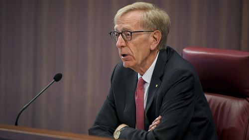 Commissioner Kenneth Hayne watched on as Mr Harris explained how Commonwealth Bank continued to offer him higher credit levels, despite him telling the bank that he didn't want to accept any more. Picture: AAP.