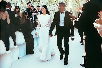 Three Times A Bride Kim Kardashian S Weddings Compared 9celebrity The 2 Million Dress Has A Long Sleeved Body Ing Mermaid Style Shape With Silk Train Instagram Kim Kardashian