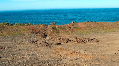 The SUV was found upside down and partially submerged at the bottom of the cliff.