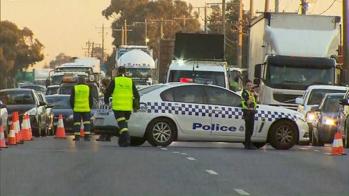 Police at the scene of the crash this morning.