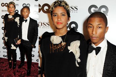 Pharrell Williams with a guest. WTF is that dress?