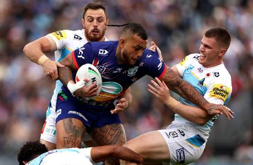 Addin Fonua-Blake is tackled during the round eight NRL match between the Warriors and the Gold Coast Titans.