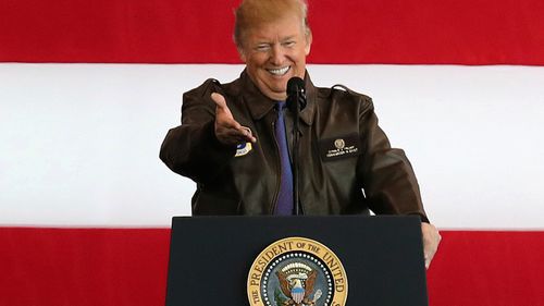 President Donald Trump delivers his speech to the US military personnel upon his arrival at the US Yokota Air Base on the outskirts of Tokyo, in 2017. 