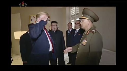 President Donald Trump salutes No Kwang Chol, minister of the People's Armed Forces of North Korea