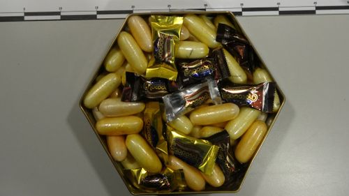 One of the boxes allegedly packed with pellets of cocaine found by officers. (Australian Federal Police)
