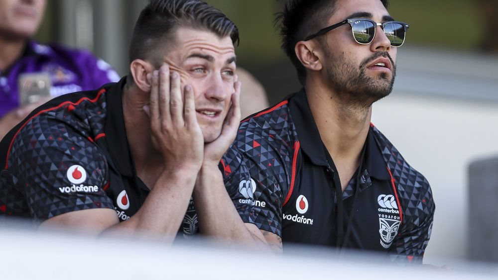 Kieran Foran and Shaun Johnson watch the Nines in Auckland. (Getty Images)