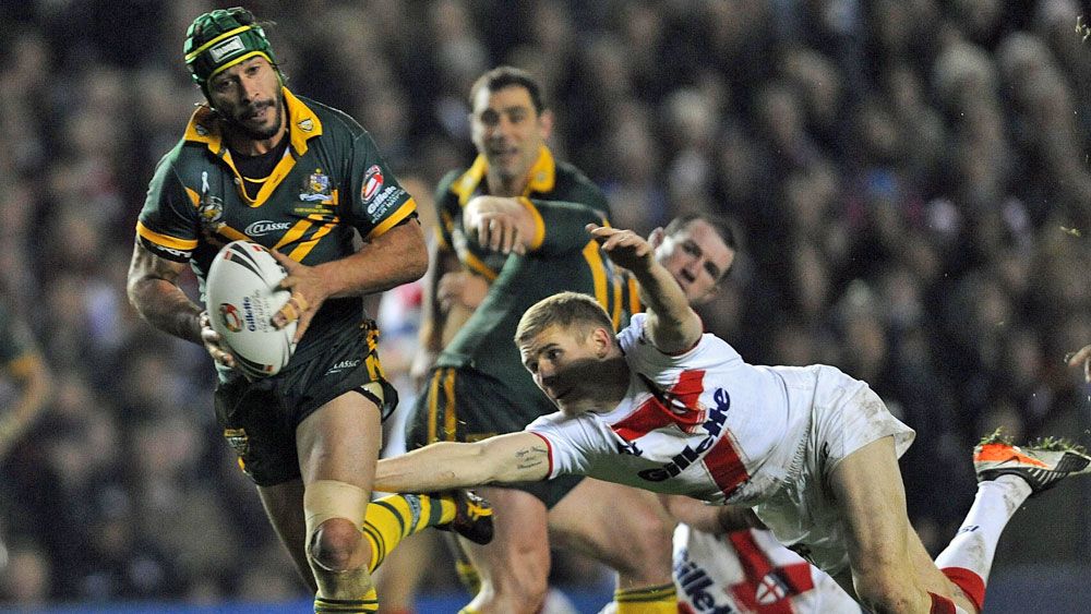 Johnathan Thurston in action for the Kangaroos against England. (AAP) 