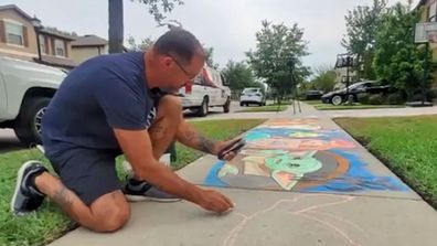 Brian Morris does Disney chalk drawings on his street footpath in Florida