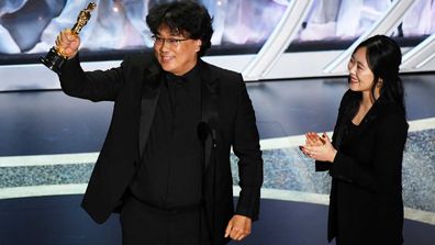 Bong Joon-ho accepts the International Feature Film award for 'Parasite'.