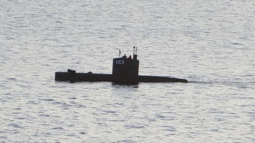 Swedish journalist Kim Wall can be seen in a photo taken of Danish submarine Nautilus in Copenhagen prior to her disappearance. (AFP)