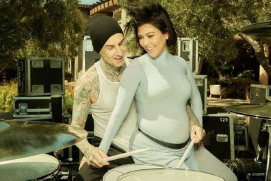 Kourtney Kardashian and Travis Barker, pictured at their gender reveal, have hinted their unborn son might be named Rocky.