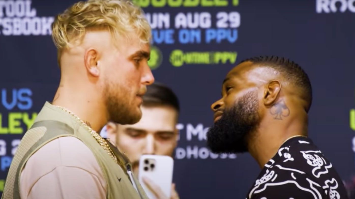 Jake Paul wheels out 'The Problem Bot' at fiery press conference ahead of Woodley clash