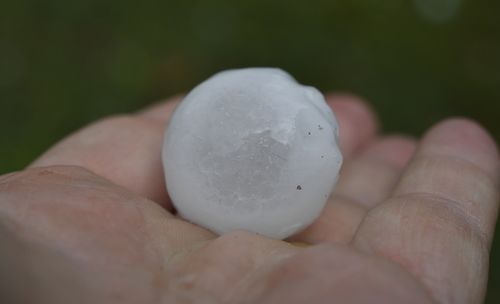 Hail stones as large as 50 cent pieces fell across the city.