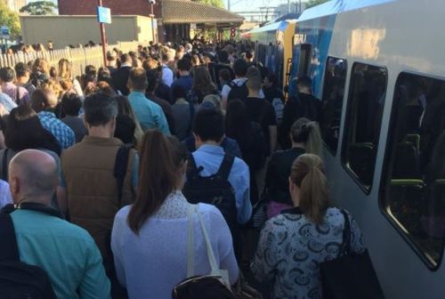 Passengers queue for a train in Clifton Hill (Twitter / @Aprilgobravo)