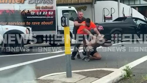 The two men fought at the intersection of Homer Street and Bayview Road in Earlwood yesterday afternoon.