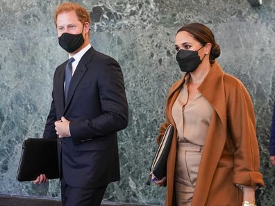 Prince Harry and Meghan, the Duke and Duchess of Sussex are escorted as they leave the United Nations headquarters after a visit during 76th session of the United Nations General Assembly, Saturday, Sept. 25, 2021. (AP Photo/Mary Altaffer)
