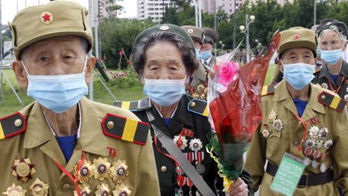 War veterans head to a hotel to attend a national conference of war veterans on the occasion of the 67th anniversary of the end of the Korean War.