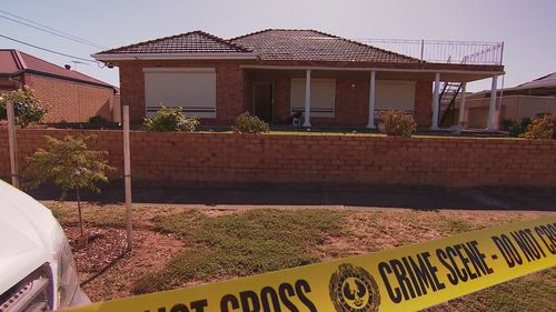 A 91-year-old great grandfather is under police guard in hospital, expected to be charged with murder, after his 85-year-old wife was found dead in their home.Victim Maria Dimasi was well-known in Adelaide's Italian community for her cooking.