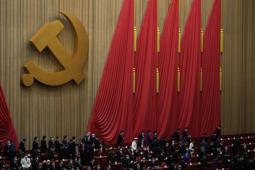 Delegates leave after the closing ceremony of the 20th National Congress of China's ruling Communist Party at the Great Hall of the People in Beijing, Saturday, Oct. 22, 2022.