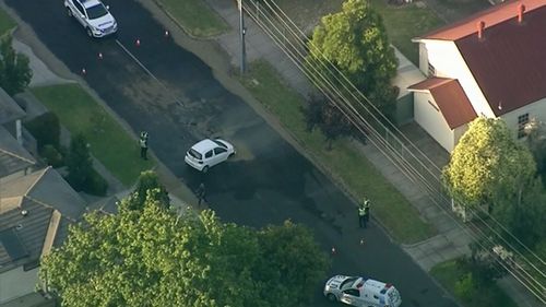 A car has plunged into a sinkhole in Gardenvale.